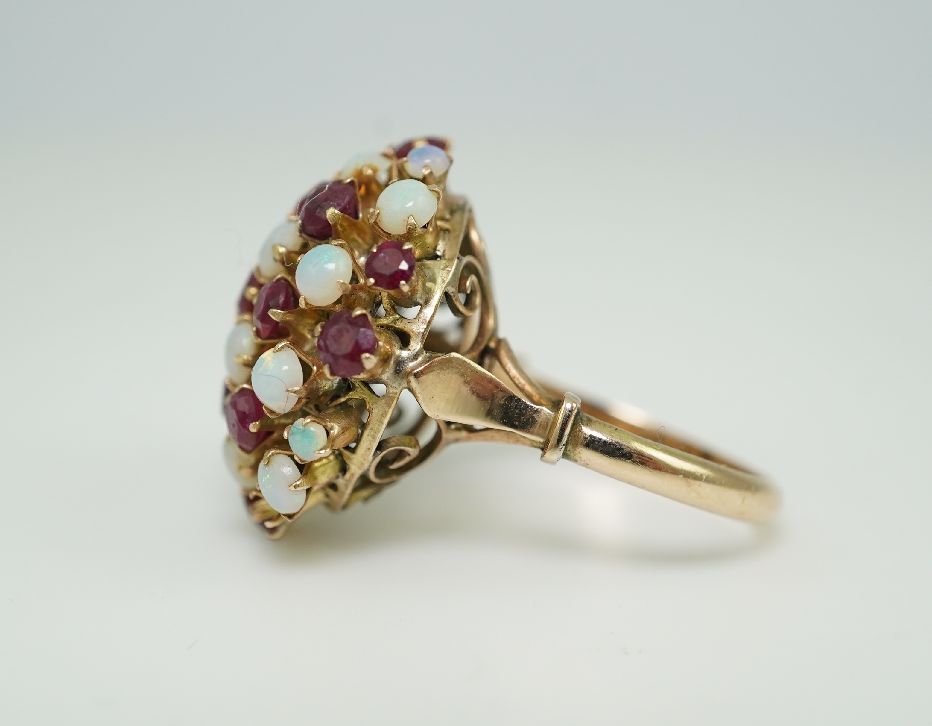 A ruby and opal cocktail ring, mid 20th century